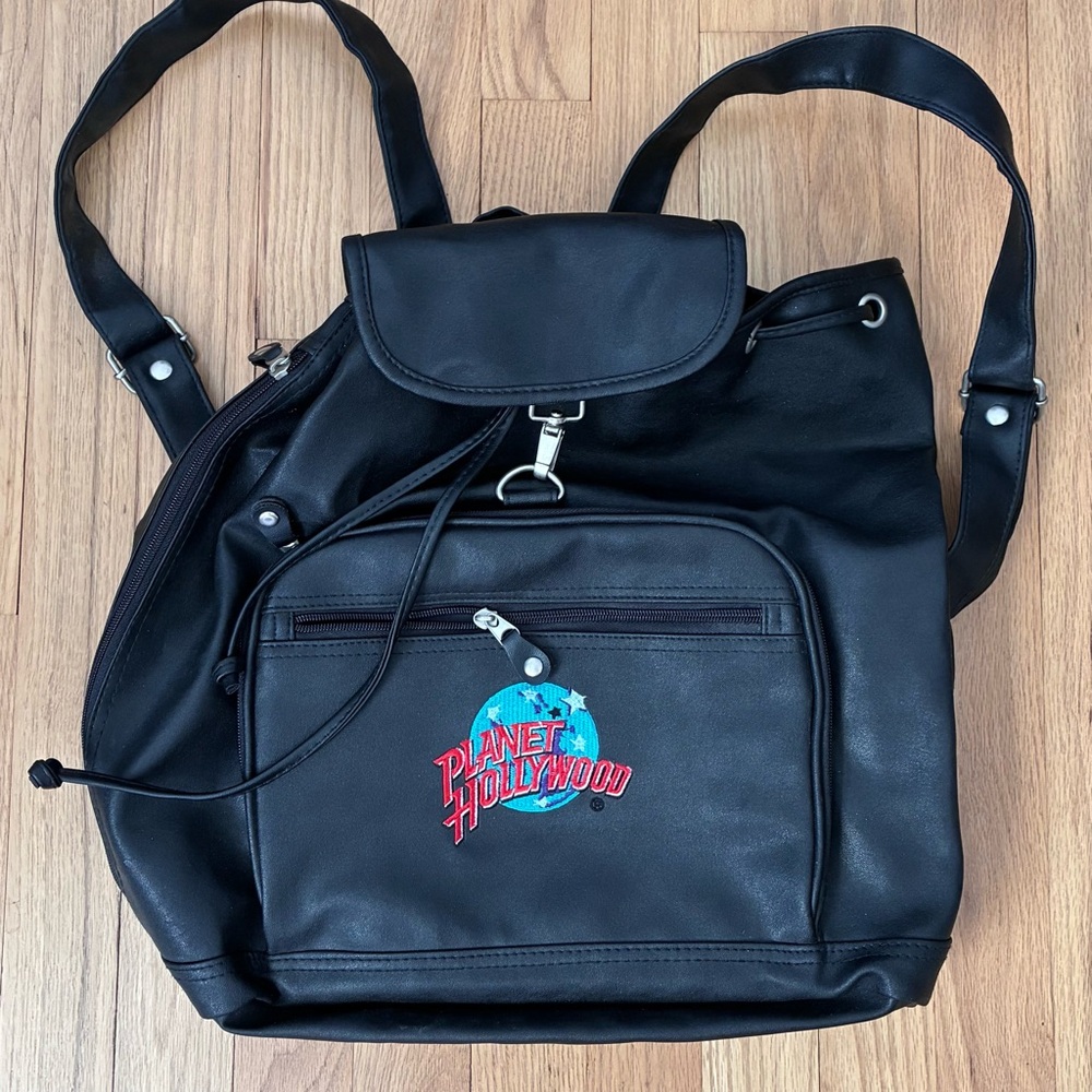 Vintage NWOT Planet Hollywood vegan  leather back pack. Black w/ embroidery